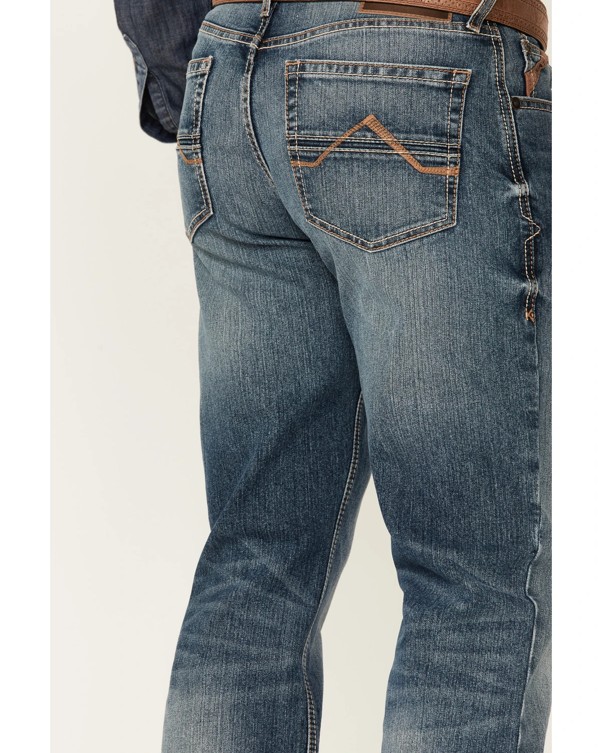 Ariat Men's M4 Campbell 2X Medium Wash Performance Relaxed Bootcut Jeans 6 Ariat Men's M4 Campbell 2X Medium Wash Performance Relaxed Bootcut Jeans - Image 4